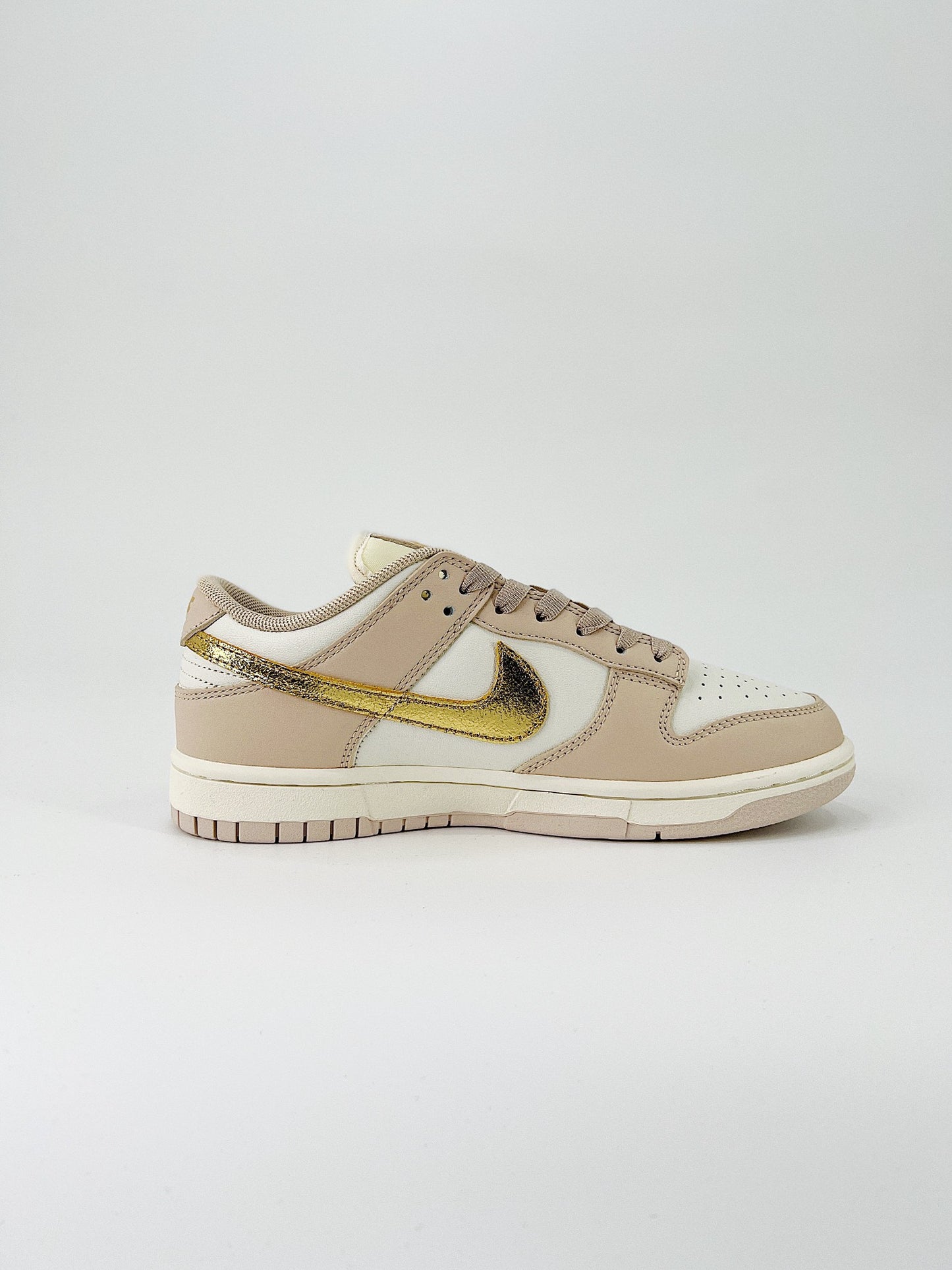 Nike Dunk Low “Gold Swoosh”